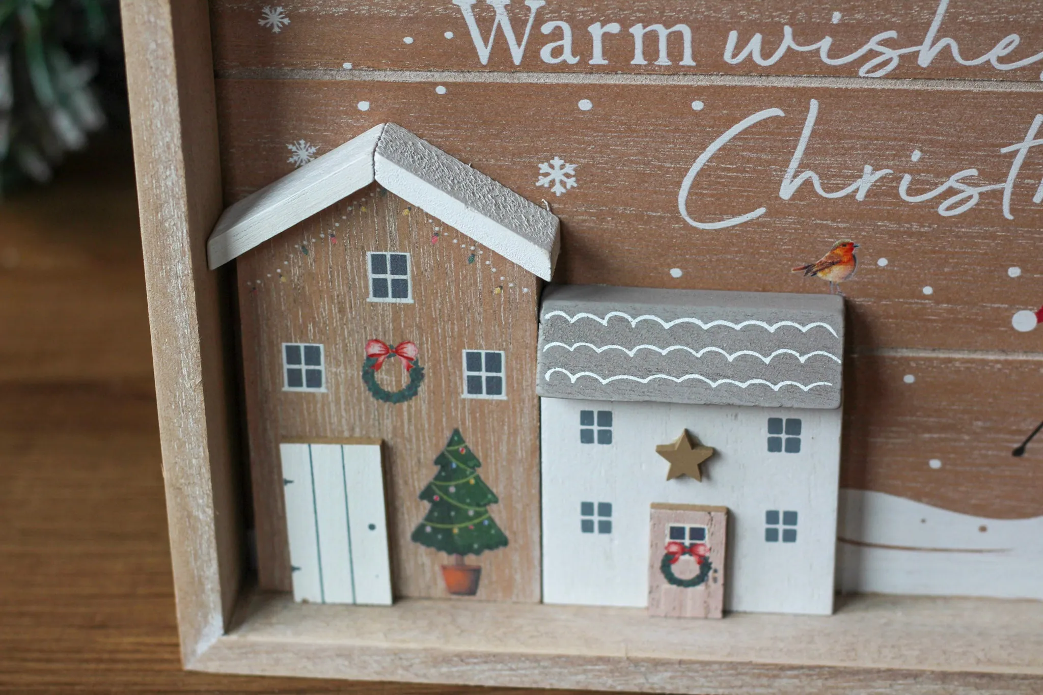 Large Festive Scene Wooden Framed Pebble People Plaque With Bottle Brush Tree